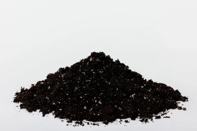 Moisture Supreme container mix pile of dark potting soil with visible perlite for moisture retention in containers
