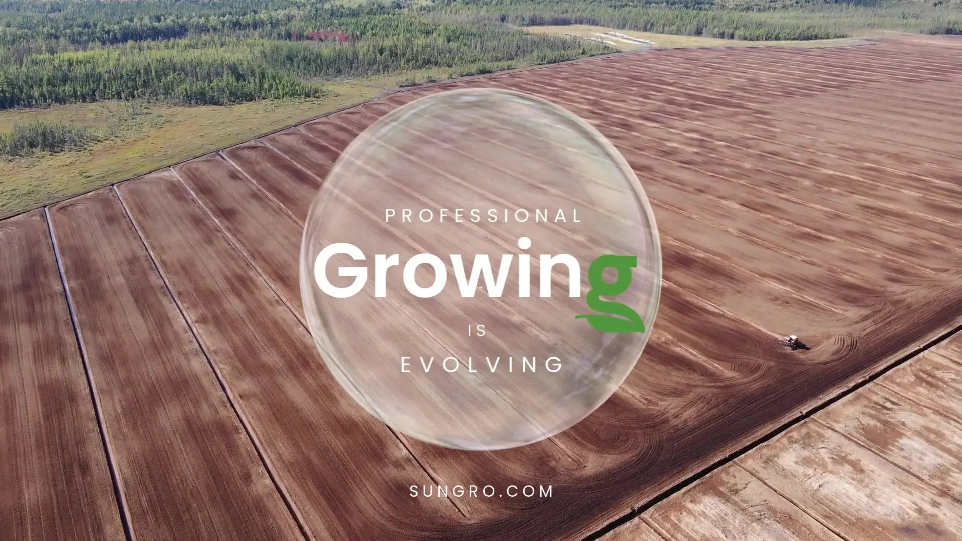 Aerial shot of plowed farmland with translucent circle overlay saying "Professional Growing is Evolving" and Sungro branding