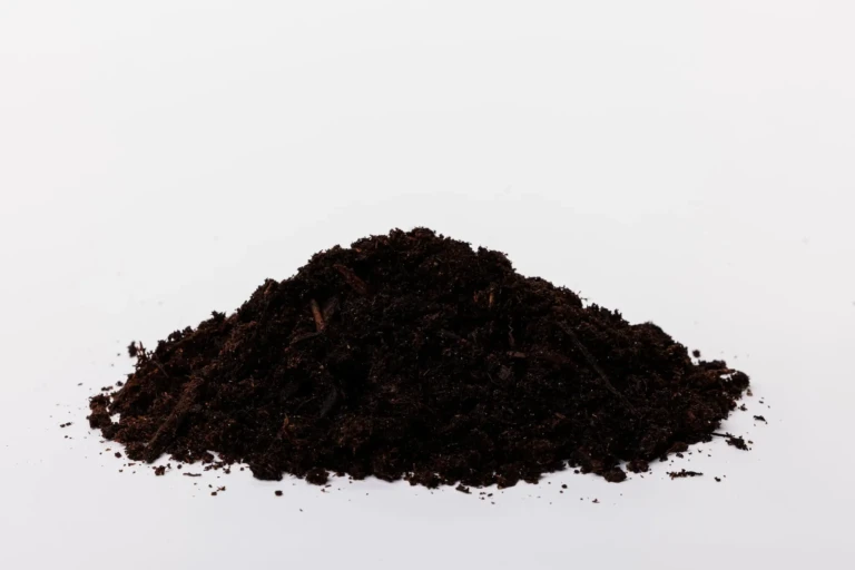 Pile of Sunshine NO Flower Vegetable Garden Soil rich organic compost on white background for planting beds and vegetables